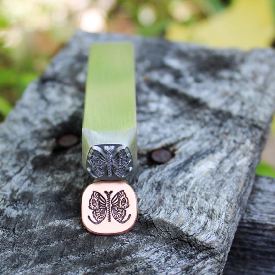 Butterfly Jewelry Stamp Small detailed image show pressed in metal with custom jewelry stamp by Buckeye Engraving