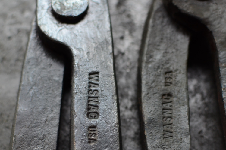 close up view of touch mark stamp of Blacksmith made pliers stamp crafted by Buckeye Engraving